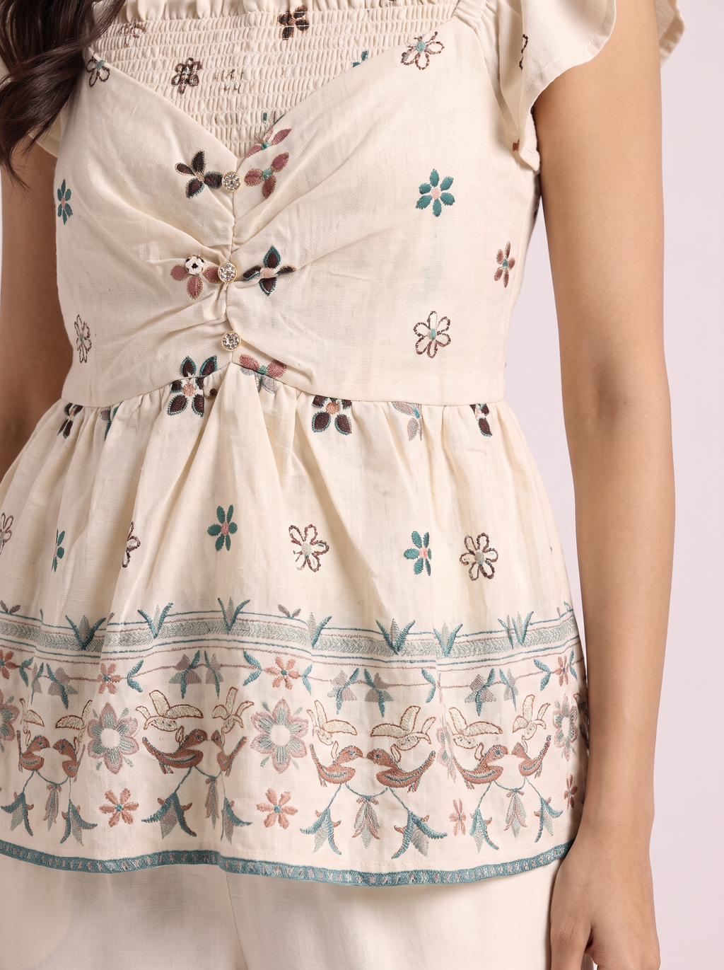 Ivory Embroidered Peplum Top